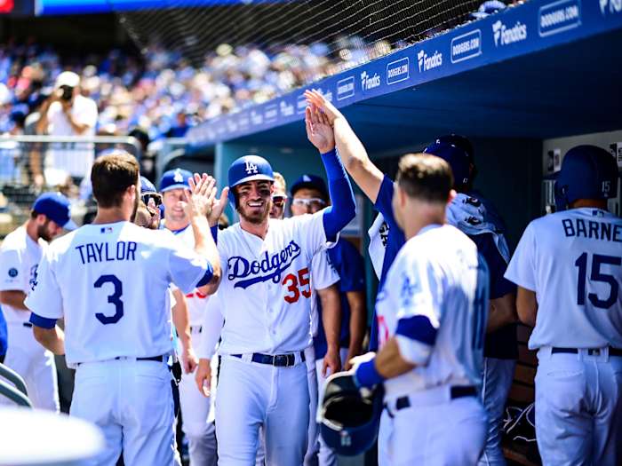 Cody Bellinger high-fives Dodgers teammates